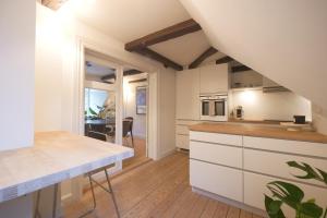 Η κουζίνα ή μικρή κουζίνα στο City Property +21 φωτογραφίες