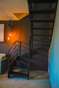 Postel nebo postele na pokoji v ubytování Hôtel-Restaurant Bel Ami