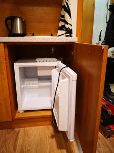 Kuchyňa alebo kuchynka v ubytovaní Apartmán Sedmička Horec