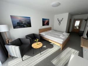 Katil atau katil-katil dalam bilik di Hotel VARNSDORF