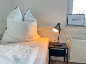 Postel nebo postele na pokoji v ubytování Hegau Boardinghouse