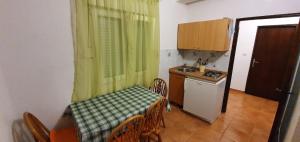 Kuchyňa alebo kuchynka v ubytovaní Holiday apartment Natali - by TA Leut Agency