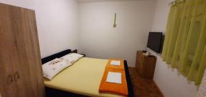 Posteľ alebo postele v izbe v ubytovaní Holiday apartment Natali - by TA Leut Agency