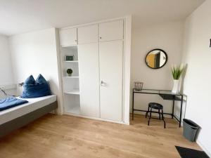 Postel nebo postele na pokoji v ubytování Hegau Boardinghouse