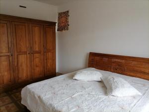 Ένα ή περισσότερα κρεβάτια σε δωμάτιο στο Khushi's Guest House - Cascavelle
