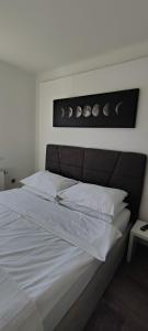 Ein Bett oder Betten in einem Zimmer der Unterkunft Perfect Place 32