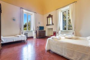 Postel nebo postele na pokoji v ubytování B&B Luxury da Salvatore + 37 fotografií