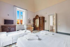 Postel nebo postele na pokoji v ubytování B&B Luxury da Salvatore