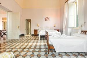 Postel nebo postele na pokoji v ubytování B&B Luxury da Salvatore