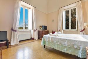 Postel nebo postele na pokoji v ubytování B&B Luxury da Salvatore