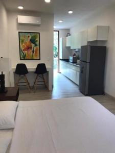 Η κουζίνα ή μικρή κουζίνα στο Estudio en Puerto Aventuras, Condominio con Alberca # 202