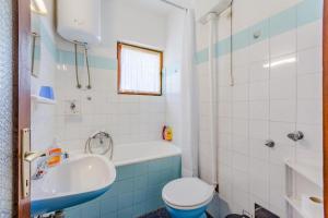 Koupelna v ubytování Apartment Duje