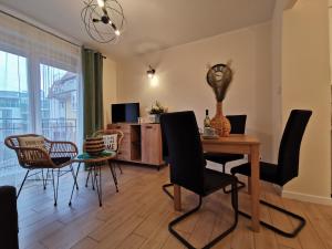 Posedenie v ubytovaní Apartament Kołobrzeg Port Welcome Home