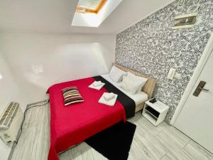 Postel nebo postele na pokoji v ubytování Apartmani Aleksandra u centru grada
