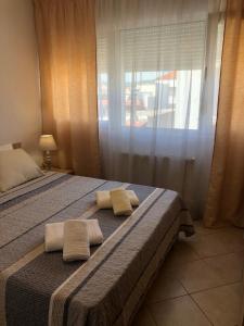Posteľ alebo postele v izbe v ubytovaní Apartment sea view