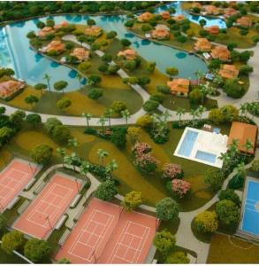 un modelo de parque con pistas de tenis y casas en Buzios Requinte & Sofisticação, en Búzios