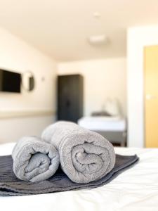 Postel nebo postele na pokoji v ubytování Hegau Boardinghouse