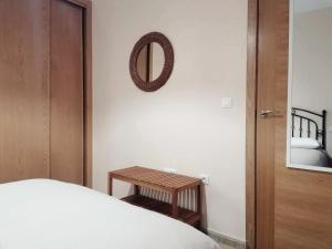 Łóżko lub łóżka w pokoju w obiekcie APARTAMENTO EN PUNTA UMBRÍA