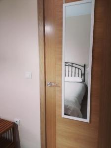 Łóżko lub łóżka w pokoju w obiekcie APARTAMENTO EN PUNTA UMBRÍA