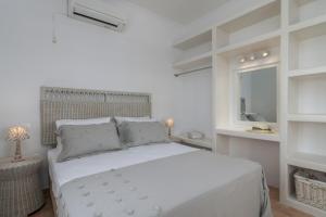 מיטה או מיטות בחדר ב-Vitalis Residences - Rural Living