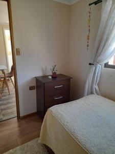Postel nebo postele na pokoji v ubytování Entre tizones y brujos ( cabaña Maggie)