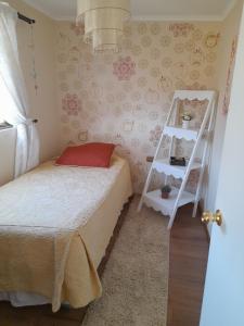 Postel nebo postele na pokoji v ubytování Entre tizones y brujos ( cabaña Maggie)