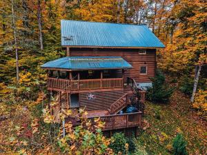an aerial view of a house with a blue roof at Mama Bear's Retreat in Sevierville