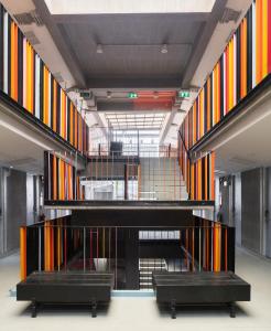 a view of a building with colorful staircases at Lub d Bangkok Siam in Bangkok