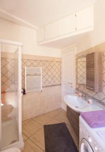 a bathroom with a sink and a shower at Sophie's Choice 2 in Rome