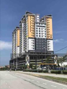 a large building on the side of a road at Maryam’s House (Lovely Seaview apartment ) in Kuala Terengganu