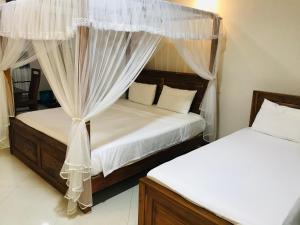 Een bed of bedden in een kamer bij Leisure Port Restinn