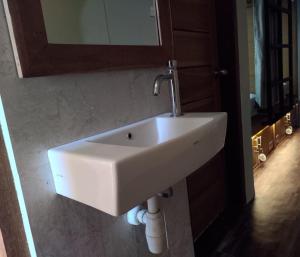 Koupelna v ubytování Hastina Hotel Lombok