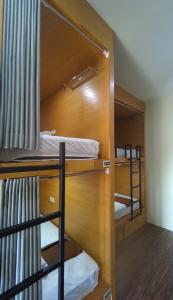 Postel nebo postele na pokoji v ubytování Hastina Hotel Lombok