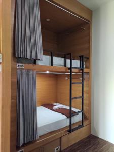 Postel nebo postele na pokoji v ubytování Hastina Hotel Lombok