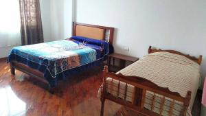 מיטה או מיטות בחדר ב-Casas Danadri, Como En Casa