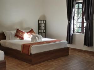 Кровать или кровати в номере The Dream Resort & Spa