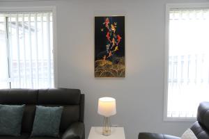 Χώρος καθιστικού στο Holiday Room with share bathroom
