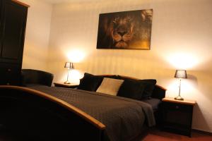 Postel nebo postele na pokoji v ubytování Stadthotel