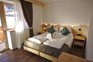 Agritur Maso Piasina客房内的一张或多张床位
