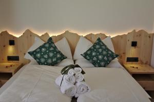 Agritur Maso Piasina客房内的一张或多张床位