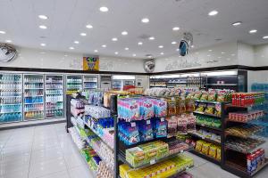 a grocery store aisle with a lot of products at Club ES Jecheon Resort in Jecheon
