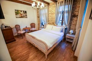 Postel nebo postele na pokoji v ubytování Vila Sonnet