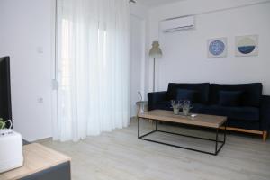 Area soggiorno di Danai & Palm Residential Complexes