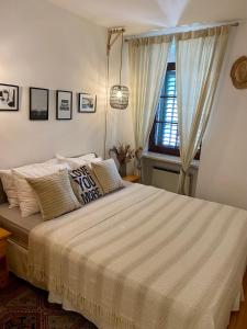 Postel nebo postele na pokoji v ubytování La Casa di Lola