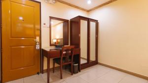 Foto Manilas asuva majutusasutuse Peace Hotel by RedDoorz galeriist