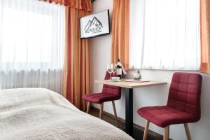 Letto o letti in una camera di Gasthof Pension Berghof