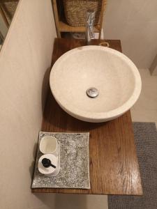a bathroom with a sink and a counter with a soap at Villa Olivari - apt il Melograno in Camogli