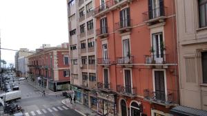 a view of a city street with buildings at Piccinni house in Bari