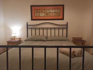 Postel nebo postele na pokoji v ubytování Piccinni house