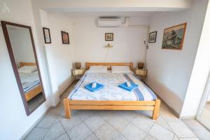 Postel nebo postele na pokoji v ubytování Villa Goga